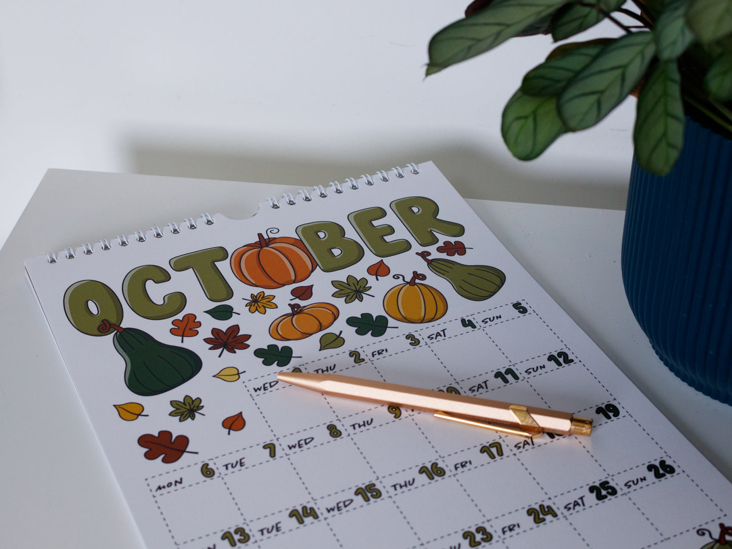 2025 Colourful Wall Calendar laying flat - October with Pumpkin Design