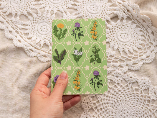 A6 Handmade Notebook with Spring Foraging Design - held in hand