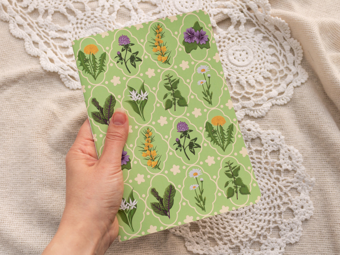 A5 Handmade Notebook with Spring Foraging Design - Held in hand