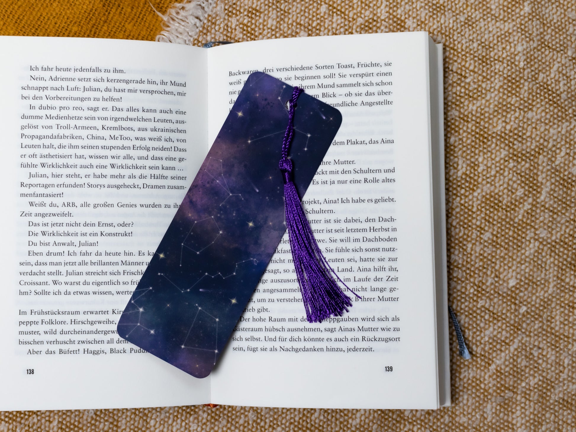 Cosmic Bookmark with Purple Tassel - in book