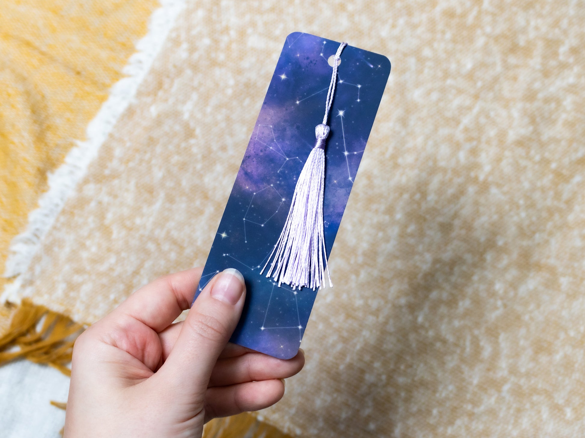 Cosmic Bookmark with Tassel - held in hand