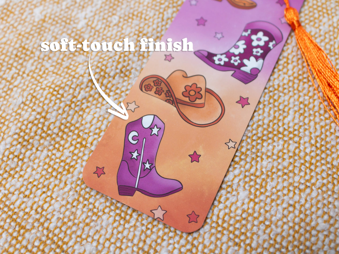 Cowgirl / Cowboy / Cowthey Bookmark with Tassel - close up - TEXT OVERLAY: soft-touch finish