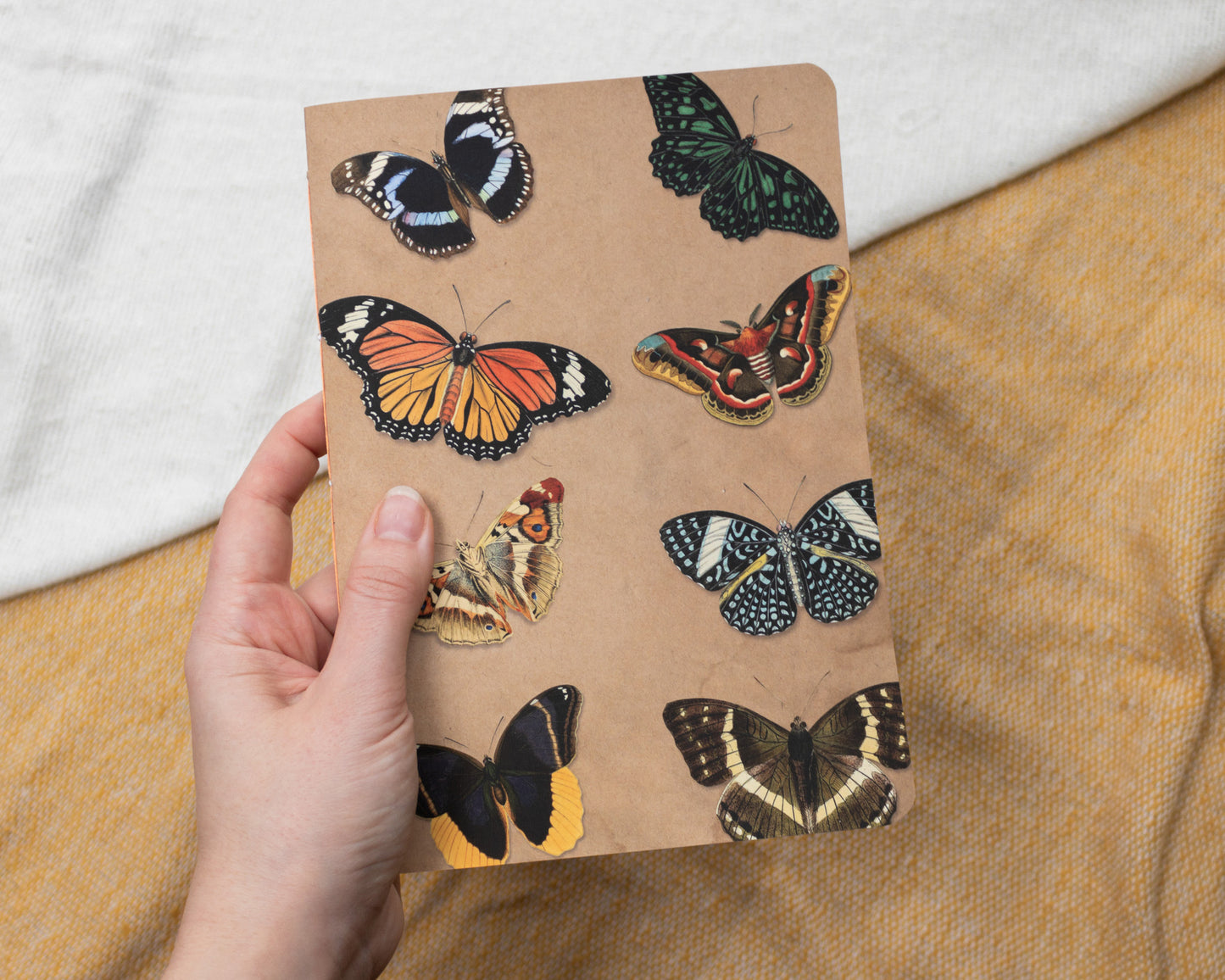 A5 Handmade Notebook with Soft Cover Journal and Vintage Butterfly Pattern - held in hand
