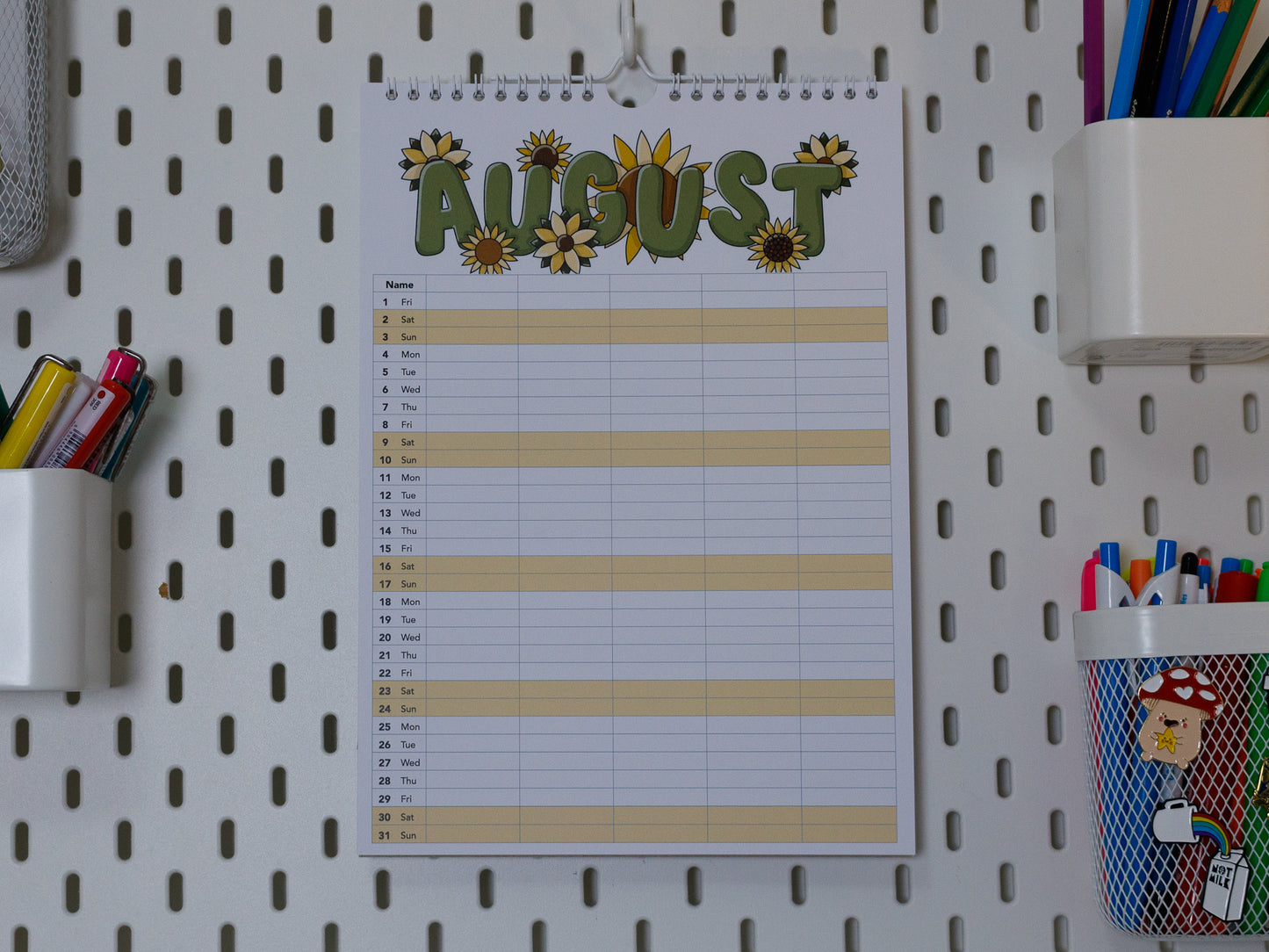 2025 Colourful Family Planner with 5 columns hanging on an office peg board - August with Sunflower Design