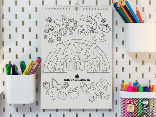 2026 Colouring Calendar on a pegboard with markers and crayons