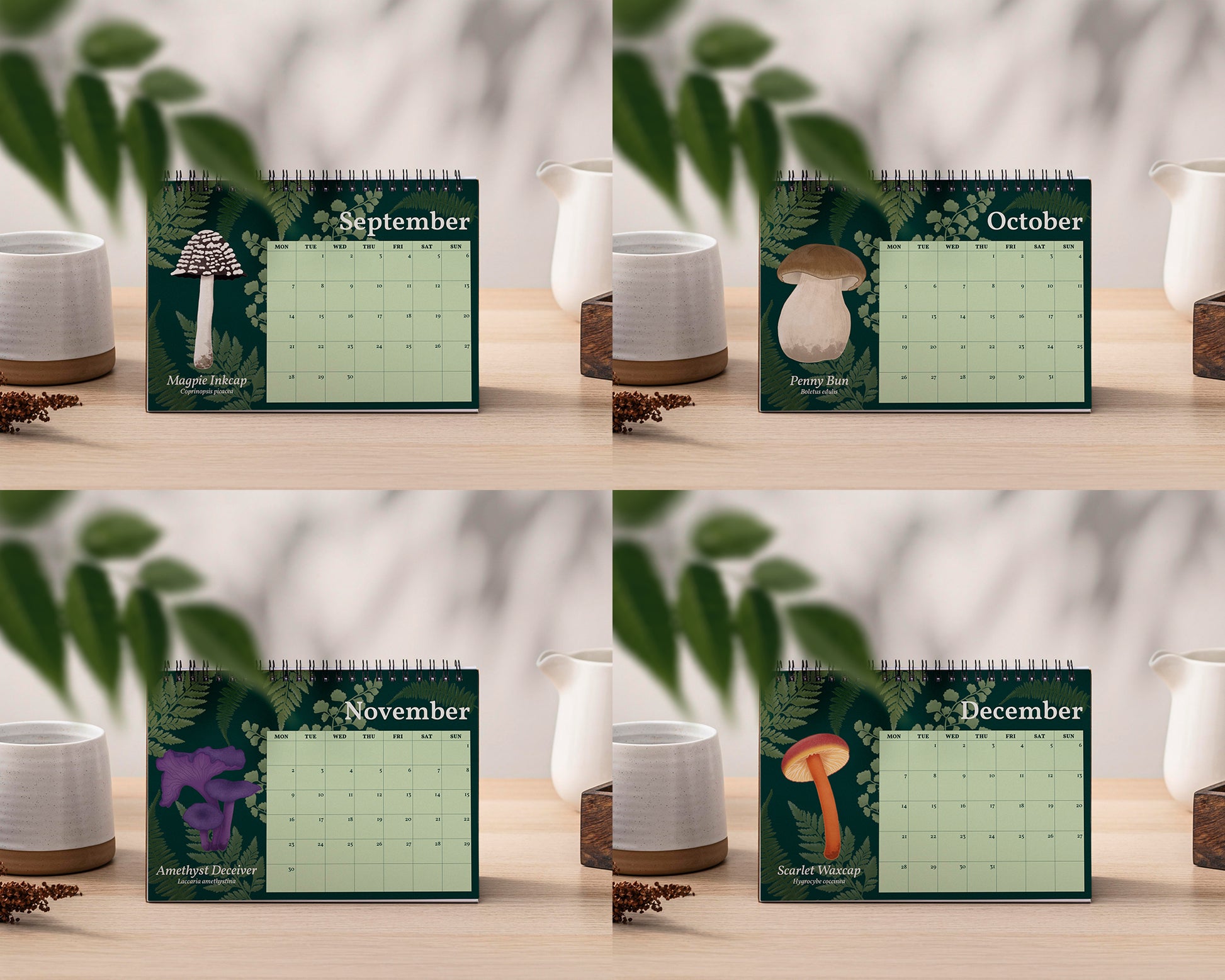 2026 Mushroom Desk Calendar - Four calendar pages for September, October, November, and December on a wooden surface with plants and a white vase.