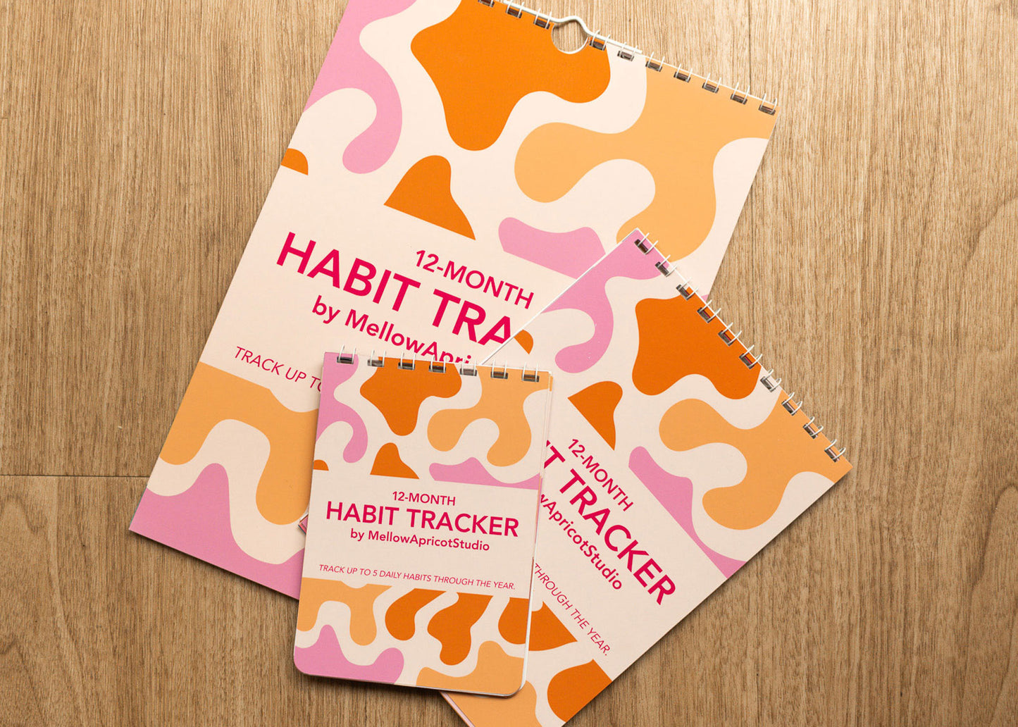Modern Colourful 12-month Habit Tracker by Mellow Apricot Studio - cover in three different sizes: A4, A5, A6