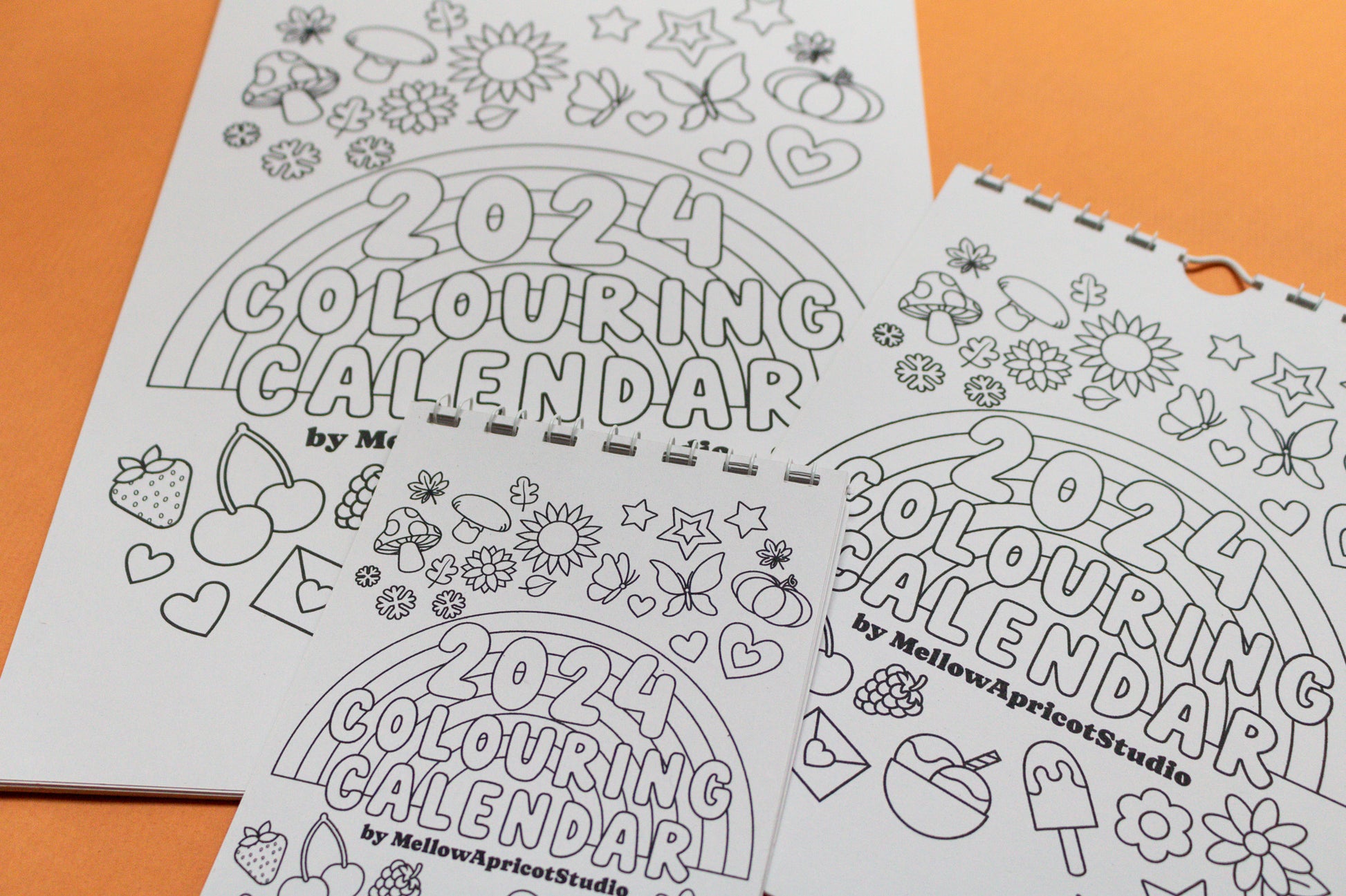 2024 Colouring Wall Calendar by Mellow Apricot Studio - cover page in three different sizes: A4, A5, A6