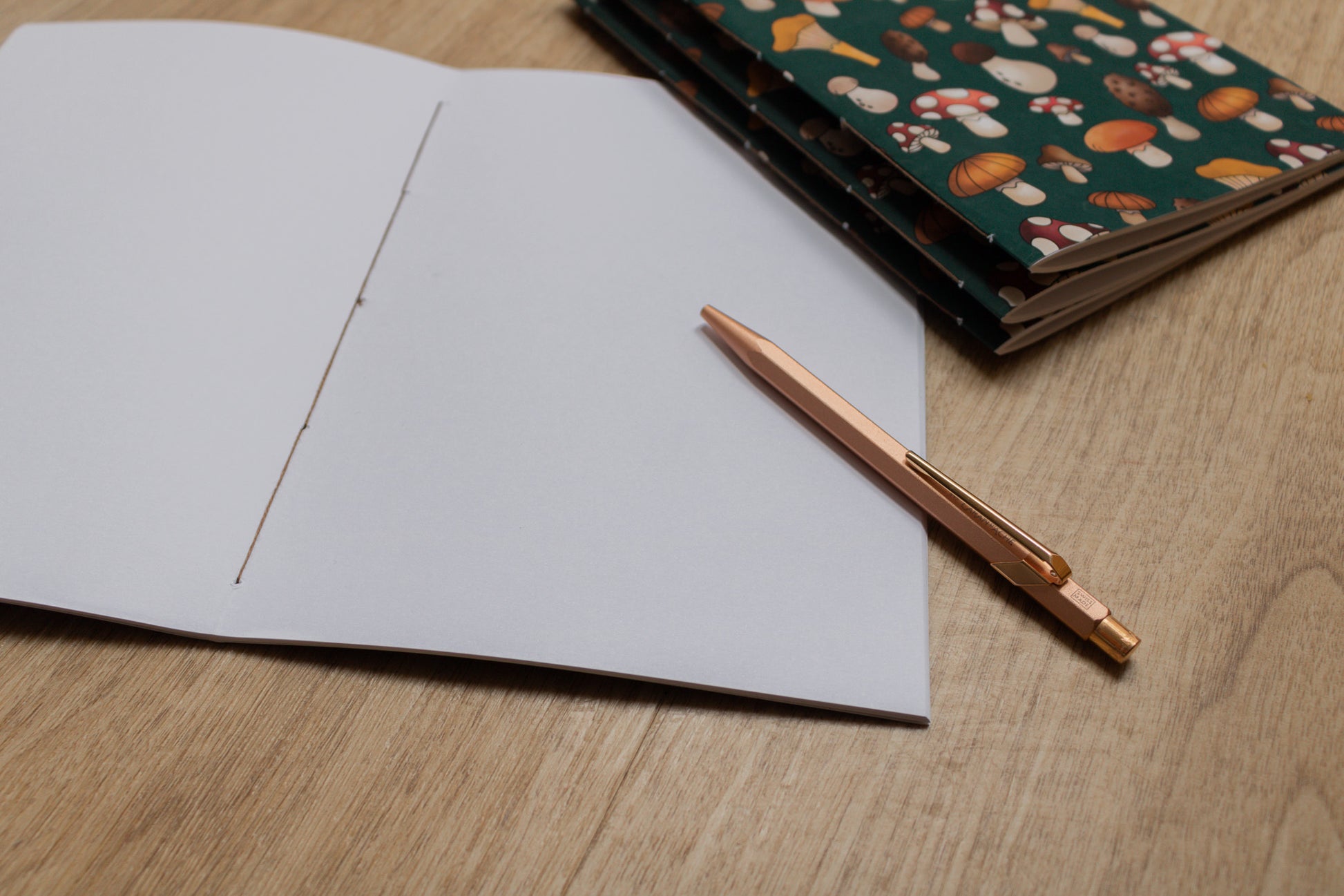 Handmade A5 notebook with mushroom design by MellowApricotStudio - blank inner
