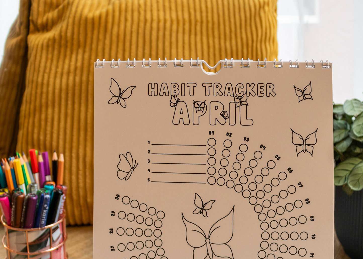 12-Month Colouring Habit Tracker by MellowApricotStudio - April page with butterflies