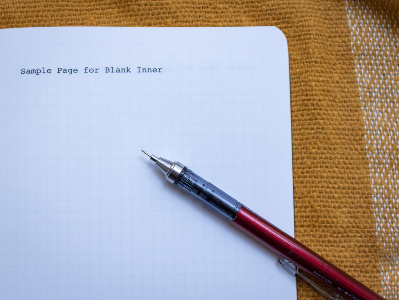 Sample page for blank inner of A5 notebook with robin illustration