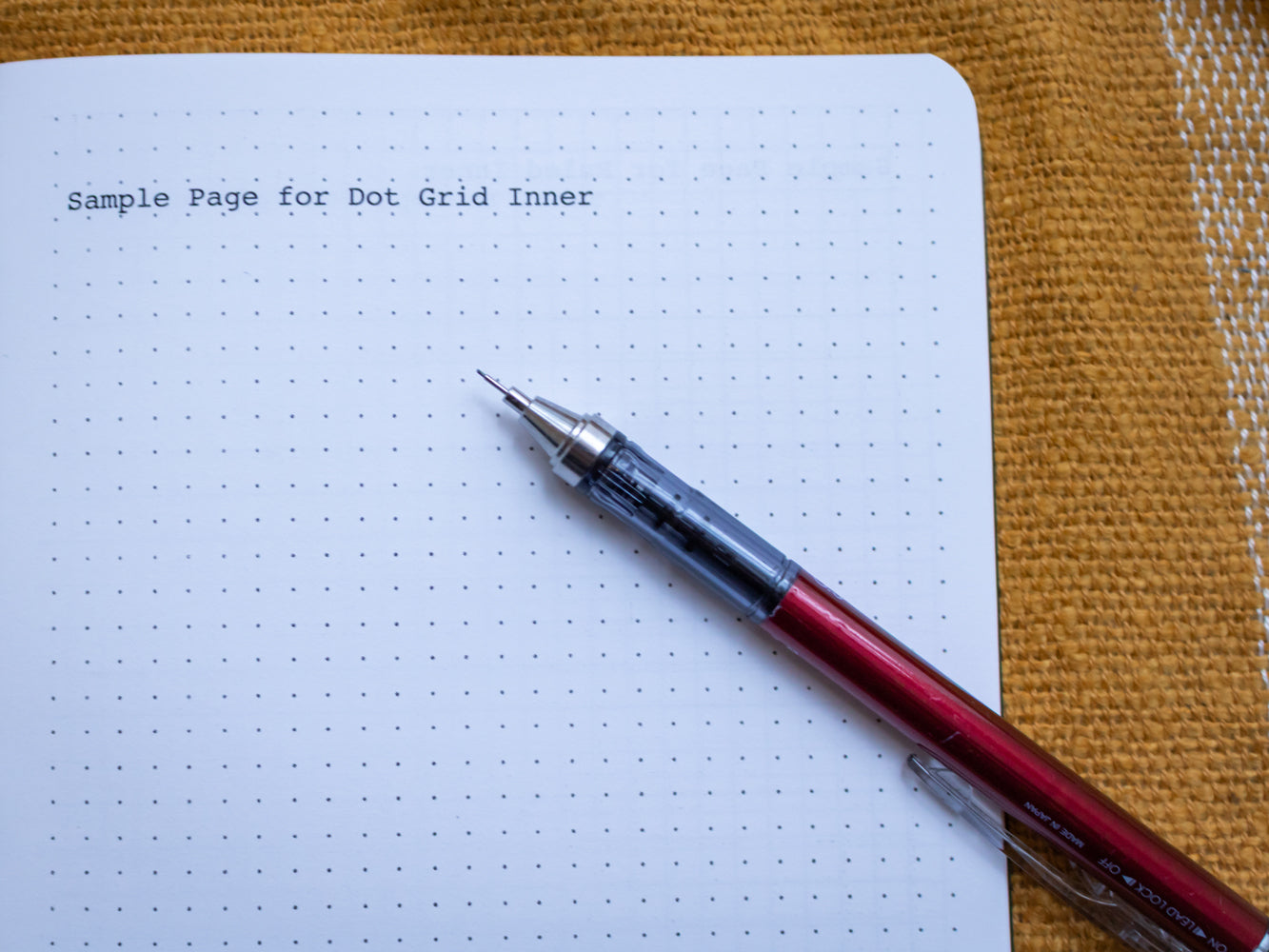 Sample page for dot grid inner of A5 notebook with robin illustration