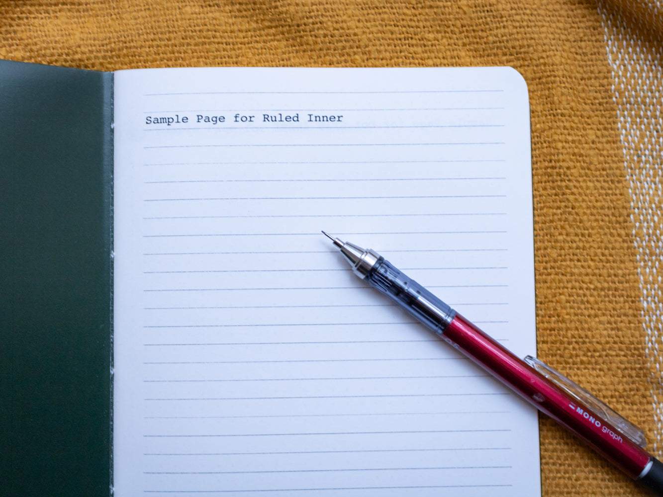 Sample page for ruled inner of A5 notebook with robin illustration