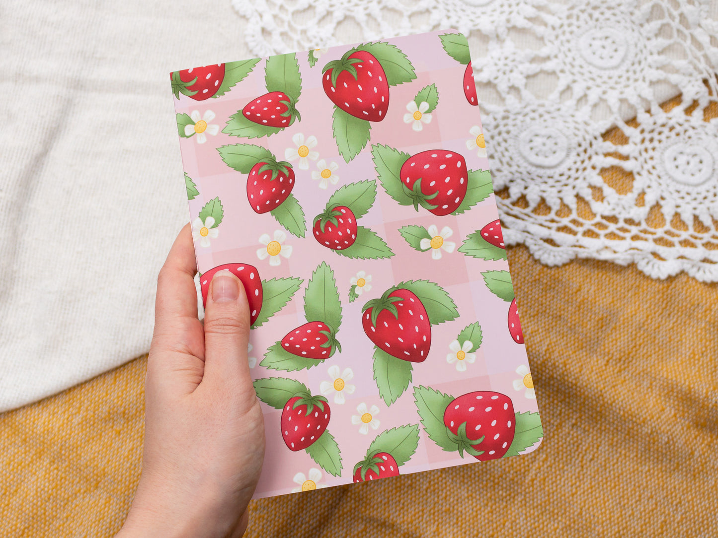 A5 Handmade Notebook with Strawberry Design - held in hand